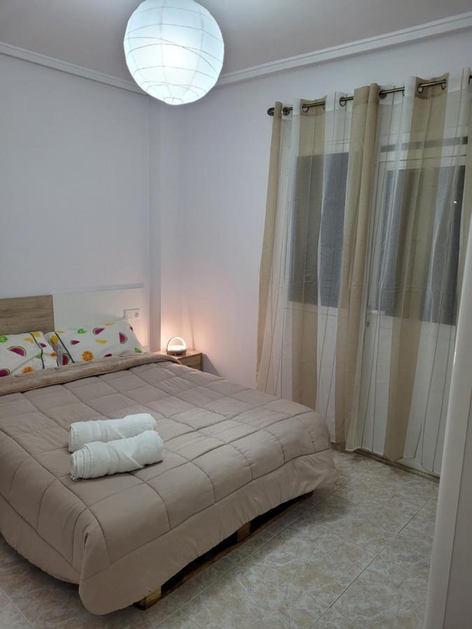 Apartamento Bajo Con Terraza Y Piscina ตอร์เรเวียคา ภายนอก รูปภาพ